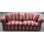 A modern country house size three seater settee, with striped upholstery, on circular feet,