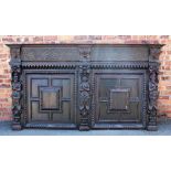 A large Victorian carved oak panel,