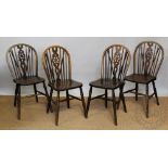 Four beech and ash wheel back country kitchen chairs, with solid seats, on turned legs,