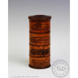 A 19th century turned treen four section spice tower, for mace, cloves, cinnamon and nut-megs,