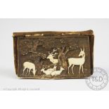 A 19th century German antler snuff box, of rectangular form with hinged cover depicting a stag,