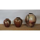 Robert Barron (Australian) three studio pottery vases, each with applied coloured glazes,