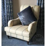 A Ralph Lauren salon arm chair, with striped cream and blue upholstery,