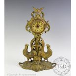 A French Art Nouveau gilt spelter figural mantel clock, modelled as two cockerels,