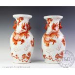 A pair of Chinese Dog of Fo vases, Qianlong seal mark,