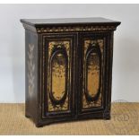 A 19th century Cantonese lacquered table cabinet, with two panelled doors enclosing five drawers,