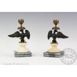 A pair of Regency style alabaster and spelter figural candlesticks,