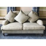 A Ralph Lauren two seater settee, with striped blue upholstery,