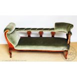 An Edwardian inlaid mahogany chaise, with scroll end and green upholstery, on bracket feet,