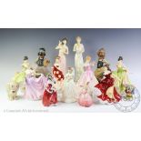 An assorted collection of Lladro and Royal Doulton figures,