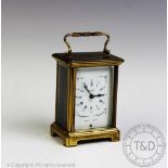A French brass carriage time piece by Duverdrey & Bloquel, with Roman numeral dial marked 'Bayard,