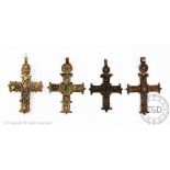 Four Ethiopian white metal pendant crosses, with applied detailing, longest 12.