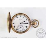 A gold plated Limit half hunter pocket watch, the circular face with white enamel dial,