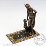 A cold painted bronze figural group after Bergmann,