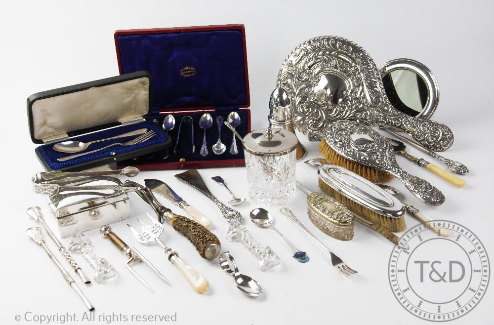 A selection of silver and silver plated items, to include: a George V silver cigarette box,