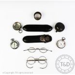 A Victorian silver mounted spectacle case and spectacles with two further examples,