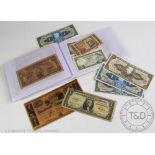 A selection of bank notes, to include an American Confederate States twenty dollar bank note,