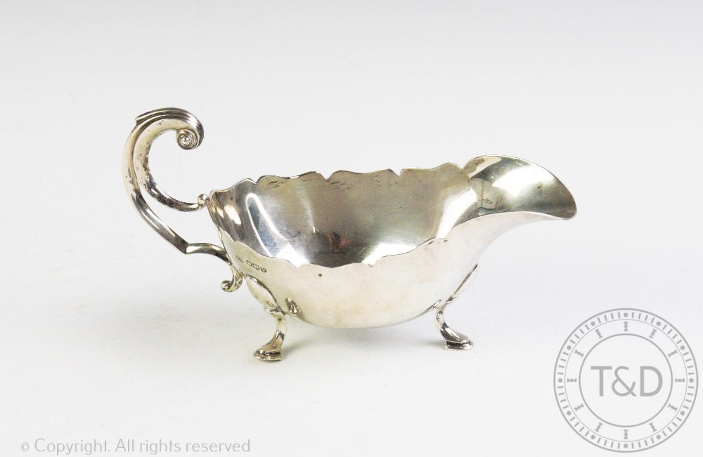 A George III style silver sauce boat, Viner's Ltd, Sheffield 1963,