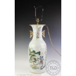 A 20th century Chinese famille rose porcelain lamp, decorated with figures in gardens,