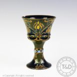 A William Moorcroft for Macintyre & Co green and gold Florian goblet, circa 1905,