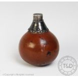 A continental white metal mounted gourd bottle, the screw cap dated '1677' and initialled 'EM',