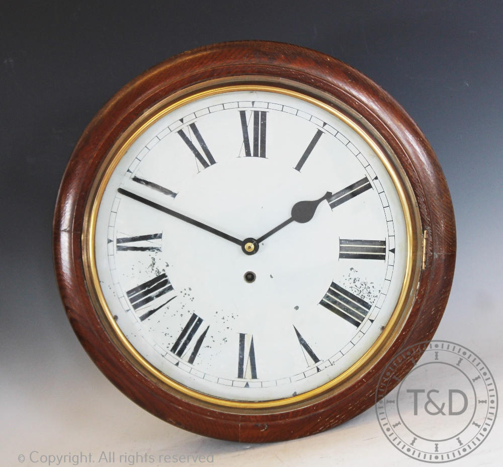 A late 19th century circular thirty hour wall time piece,
