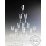A collection of Waterford Lismore pattern drinking glasses, comprising, ten champagne flutes,