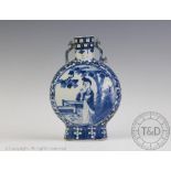A Chinese porcelain blue and white moon flask, Kangxi four character mark,