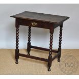 An 18th century and later oak side table, with drawer, on bobbin turned legs,