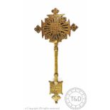 An Ethiopian brass hand cross, with engraved and intertwined detailing,
