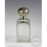 A late 19th century French silver mounted scent bottle,