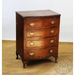 A 1930's walnut serpentine chest, with four long drawers, cabriole legs, 82cm H x 60.