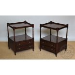 A pair of reproduction Regency style mahogany two tier side tables, with two drawers,