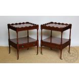A pair of reproduction Regency style mahogany two tier side tables, with drinks slide and drawer,