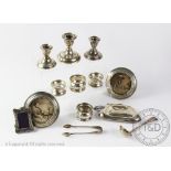 A selection of silver items to include a pair of silver photograph frames, C C May & Sons,