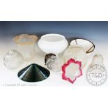 Ten assorted glass lamp shades, to include a cut clear glass lamp shade of pear shape,