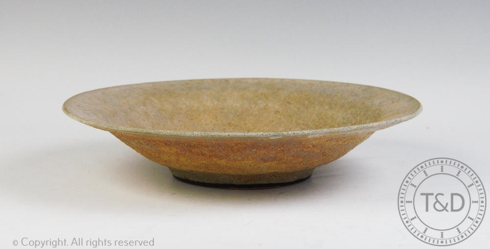 Chris Carter (British b1945) a studio pottery dish, decorated with a textured glaze, - Image 2 of 4