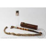 An Ashford type dog whip, with carved antler dogs head whistle finial,