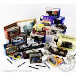 Eighteen boxed diecast vehicles, by various makers,