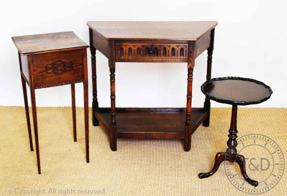 A 17th century style oak credence type table, with drawer and under tier, on turned legs, 75.