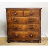 A Victorian walnut chest, of two short and three long drawers, on plinth base,