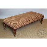 A Victorian style rectangular stool of country house proportions, with turned legs,