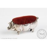 A George V novelty silver pin cushion, Levi & Salaman, Birmingham, modelled as a pig,