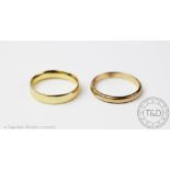 Two gold wedding bands, to include; a 9ct yellow gold example size N, weight 2.