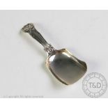 A Victorian silver caddy spoon, birmingham 1847, with sinuous shaped initialled terminal 'G.M', 9.
