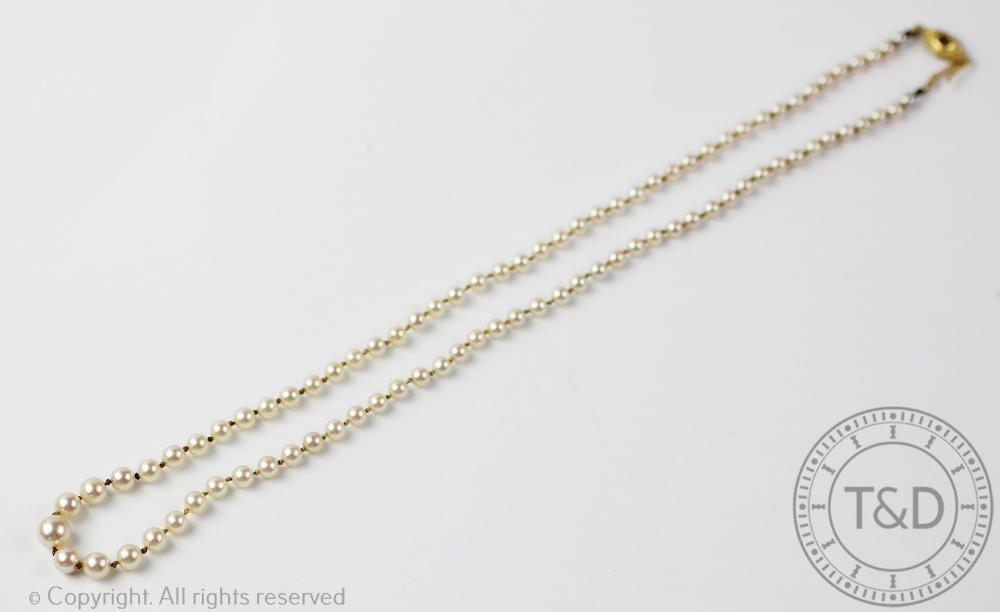 A single strand, graduated cultured pearl necklace, with attached marquise shape 18ct gold clasp, - Image 2 of 2