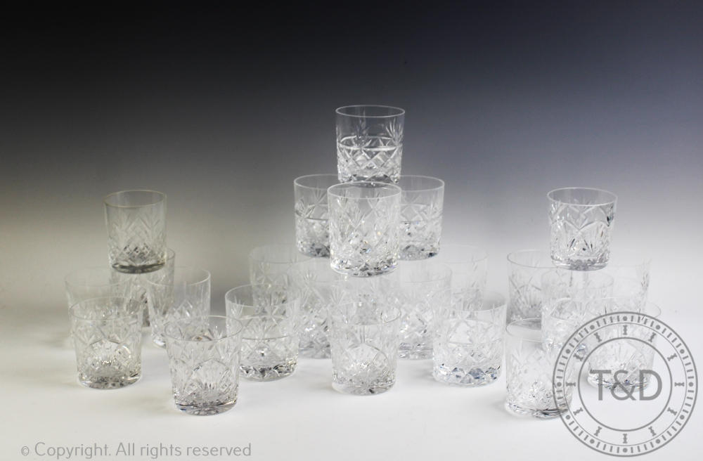 A collection of cut glass drinking glasses, to include twelve brandy balloons,