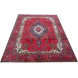A large Iranian Tabriz carpet,