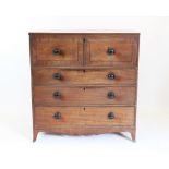 A George IV mahogany secretaire chest, circa 1820, the fitted drawer with satin and birch interior,