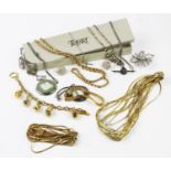 An assorted collection of gold plated and silver coloured jewellery,